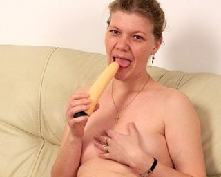 This mature slut loves to play on her couch
